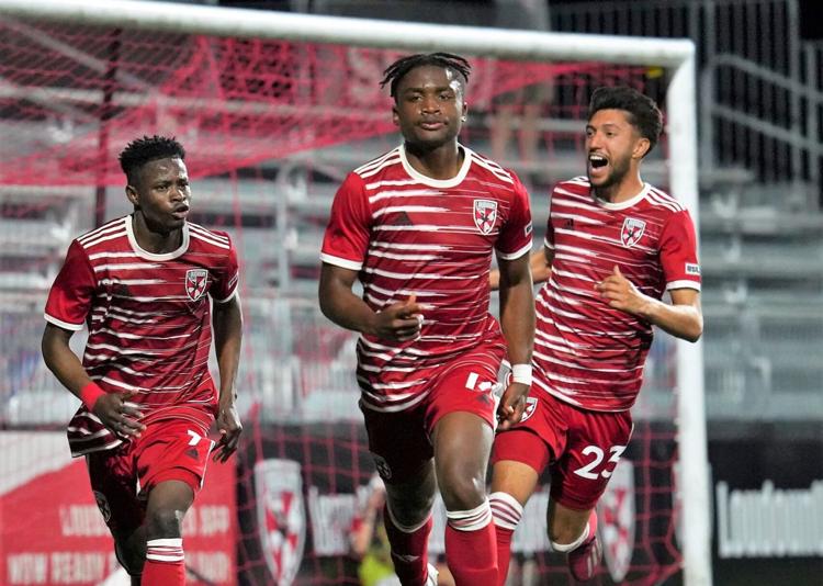 Wesley Leggett, center, scored late in the second of two 15-minute extra-time periods to lift Loudoun United FC to a 2-1 victory over North Carolina FC in a U.S. Open Cup match April 5 in Leesburg.